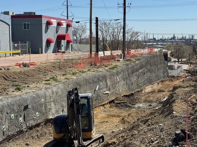 Views of water line work at Franklin, soil nail wall installation, and new poured wall just west of the railroad tracks. Photography by Estate Media. 
