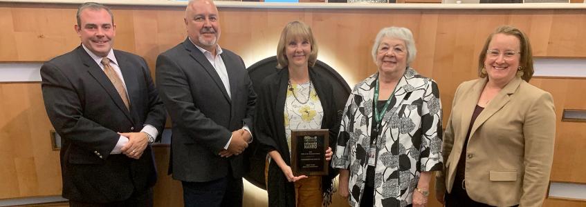 Board of County Commissioners accept NAHRO Award